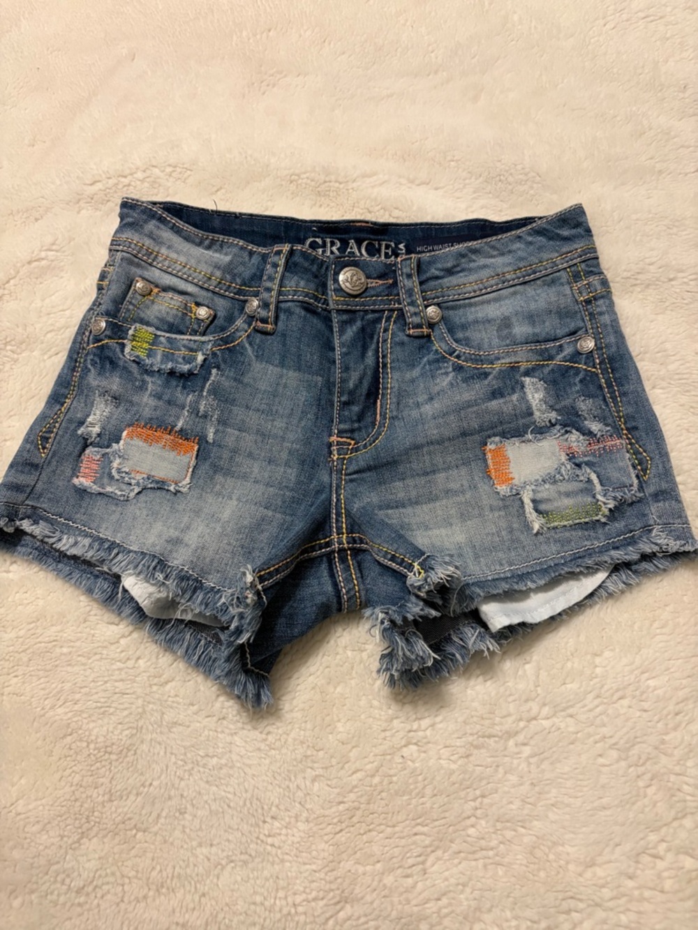 Grace Blue Distressed Denim Shorts with Orange & Green Patch Accents